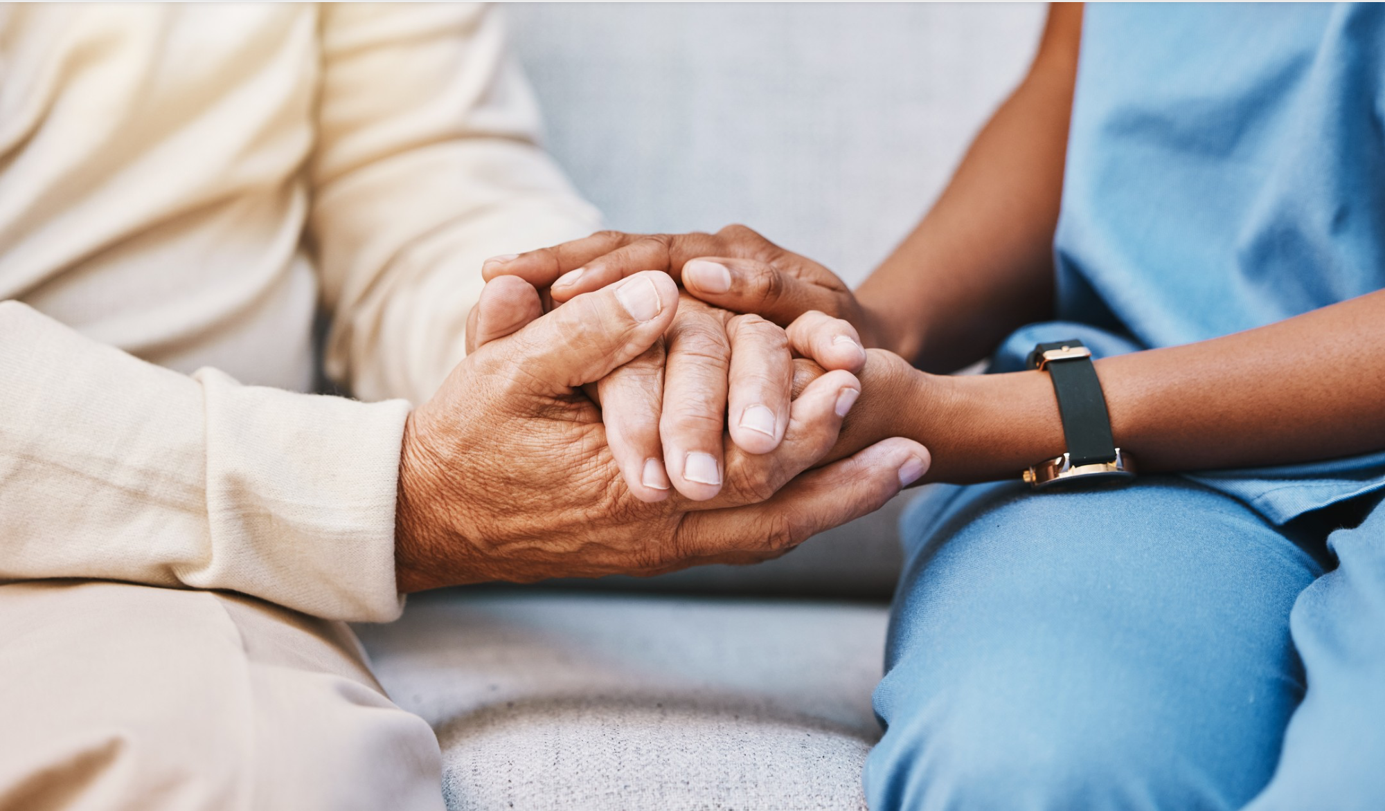 Carer and client smiling together