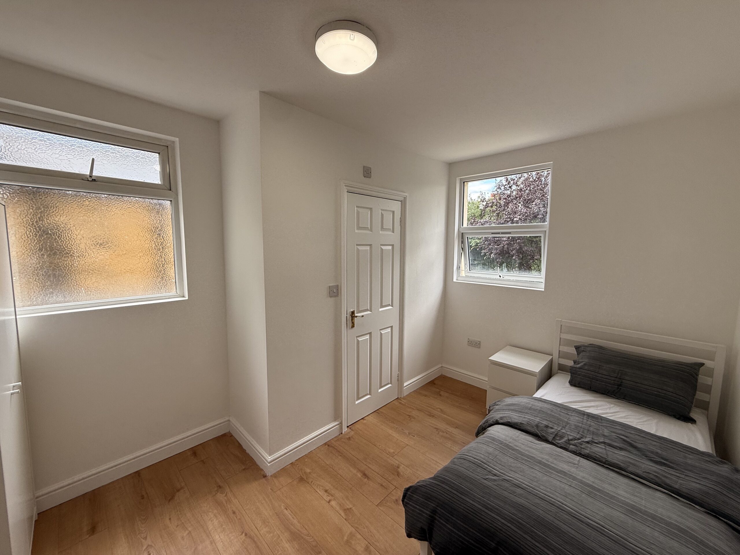 Bedroom 1 with bed and side table