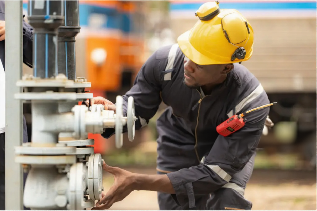 Night aerial of crude units and storage farms